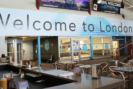 london airport welcome to london sign