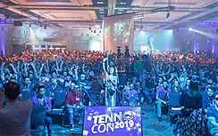 people in a conference meeting hall