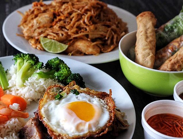 Various Vietnamese dishes on a table