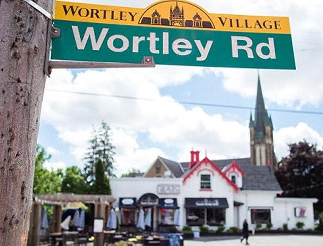 A view of the Wortley Road street sign with the Sweet Onion Bistro in Old South/Wortley Village in London, Ontario.