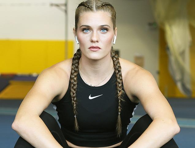 Olympic athlete Alysha Newman dressed in workout wear