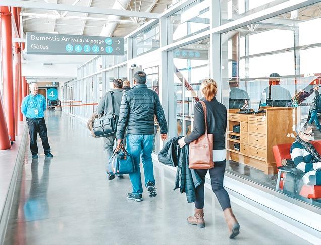 People arriving from a flight at the London International Airport located in London, Ontario, Canada