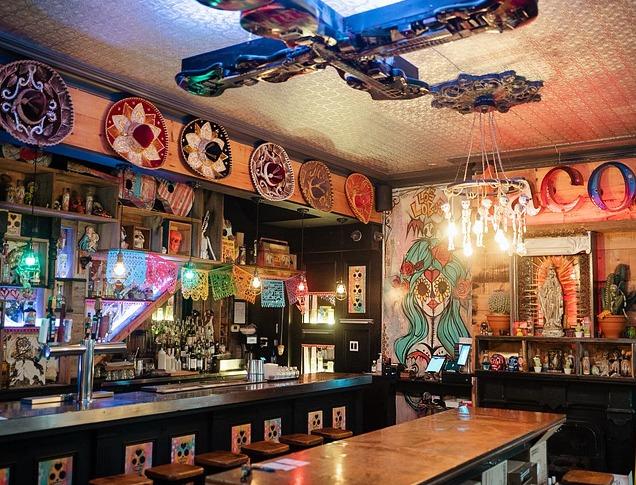 Interior view of Los Lobos' bar decorated with day of the dead artwork, located in London, Ontario