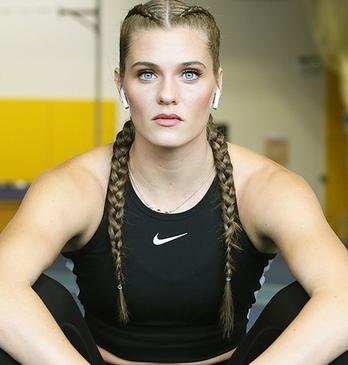 Olympic athlete Alysha Newman dressed in workout wear