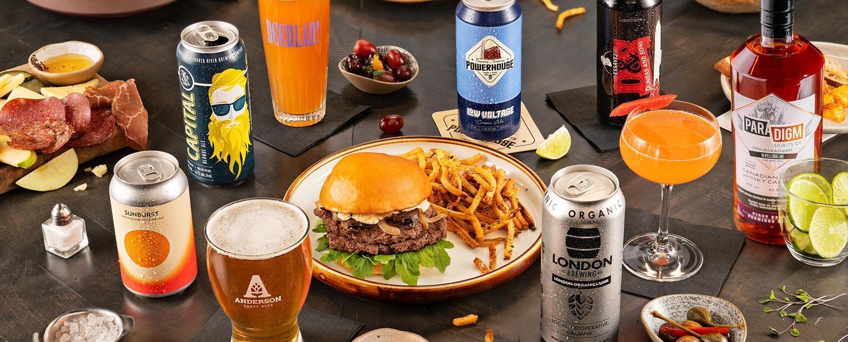 A table displaying various beers from breweries in London, Ontario and pub based food