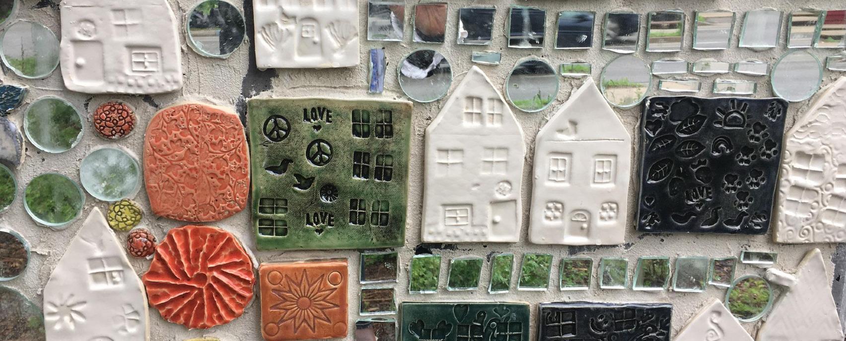 Close up of various tiles used to construct the Gateway Mosaic located in Old East Village, London, Ontario