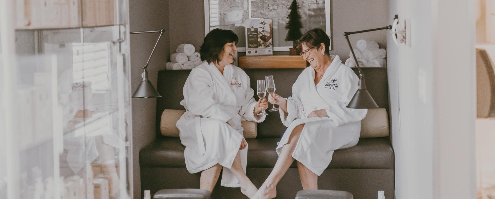 Two woman relaxing at the Idlewyd Inn Spa located in London, Ontario