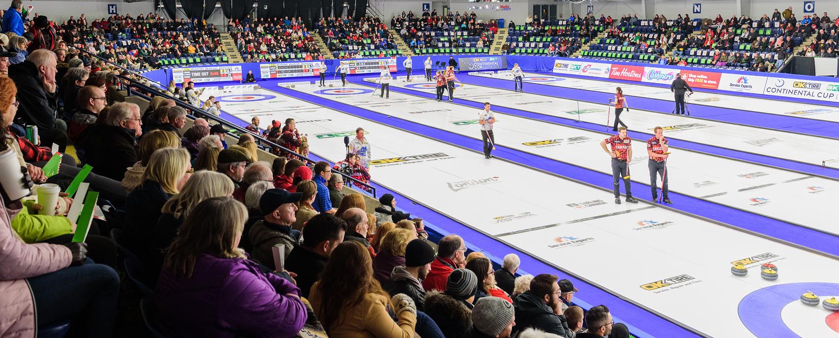 people watching ice curling