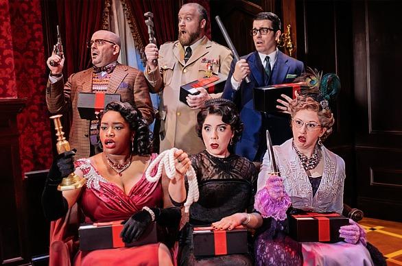 Actors from the cast of the theatre production Clue - Live on Stage dressed in various charecters from the show