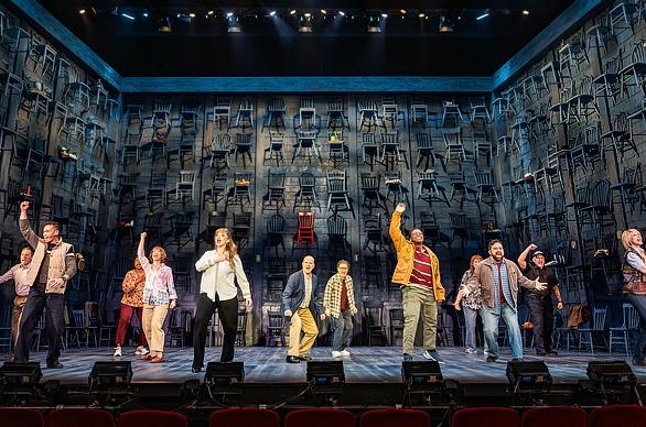 Cast members of the production 'Come From Away' performing live of stage at the Grand Theatre in London, Ontario
