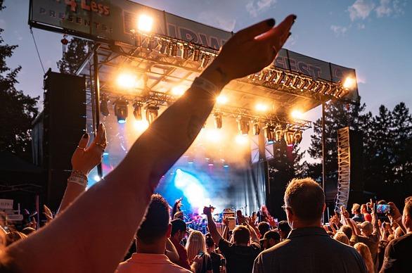 People attending a live outdoor concert at Fit4Less Fairway Fest located at East Park in London, Ontario