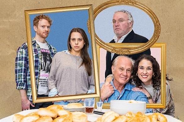 The cast from the theatre production 'In Seven Days' gathered at a table with bagels and picture frames in front of them