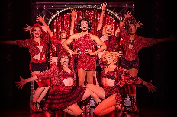 Cast members from the Broadway production Kinky Boots performing live on stage