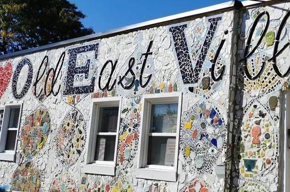 A tile mosaic mural located on the side of a building in London’s Old East Village neighbourhood