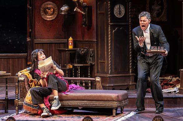 Cast members form the theatre production 'The Play That Goes Wrong' performing live on stage