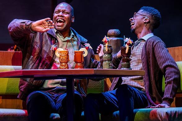 Two male actors performing a scene from the theatrical production Primary Trust