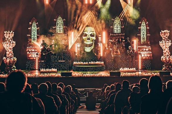 The Rock Orchestra by Candlelight performing live in a large venue with an audience watching