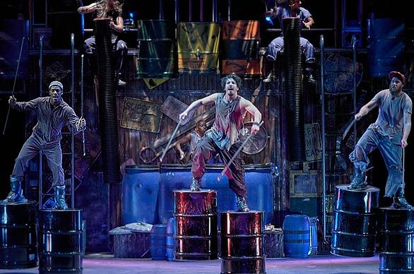 Various performers on stage on the Broadway production STOMP