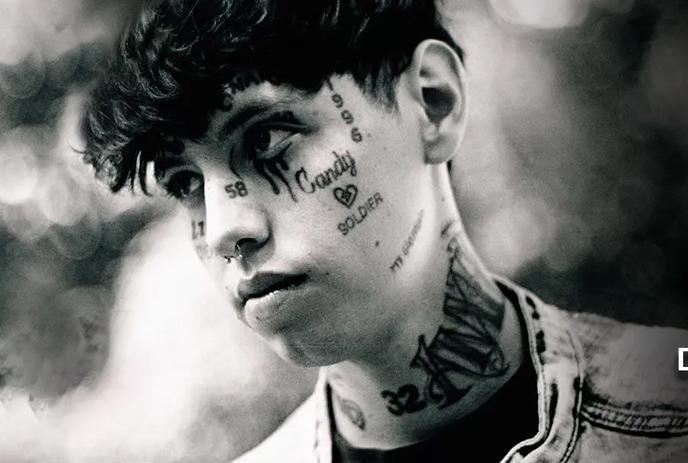 A black and white photo of Lil Xan.