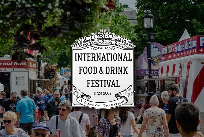 People walking through Victoria Park in London, Ontario enjoying a previous London International Food Festival