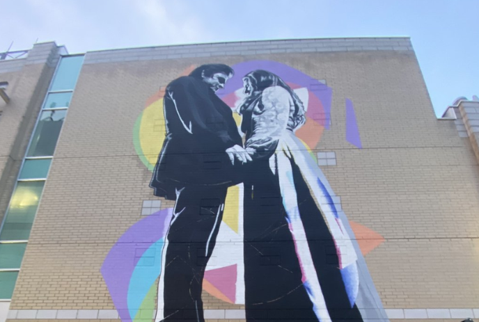 Mural at Canada Life Place of Johnny Cash proposing to June Carter.
