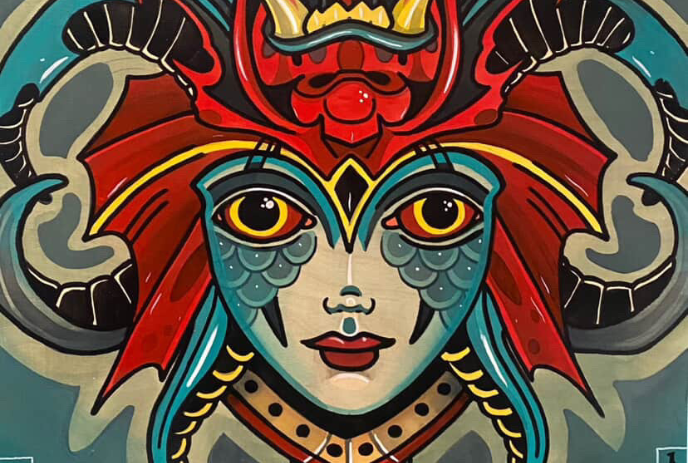 Vibrant artwork featuring a stylized face with a red and blue headdress and yellow eyes.