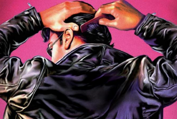 Person wearing a black leather jacket combing their hair against a pink background.