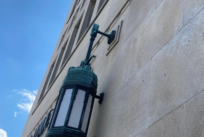 Historic lamp standard on the outside of the Dominion building in London.