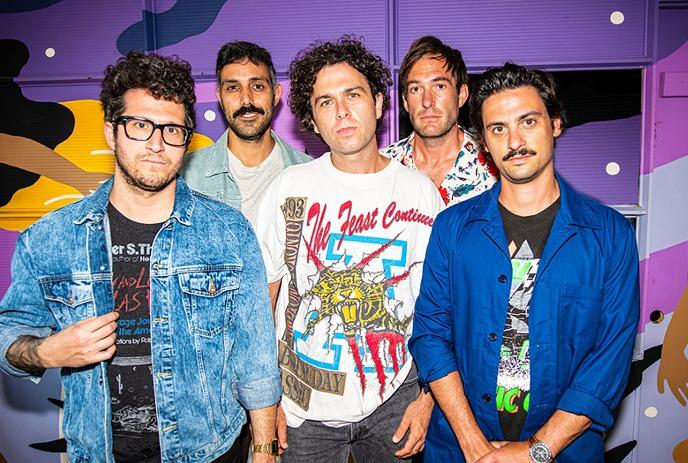 Members of the Arkells band standing together