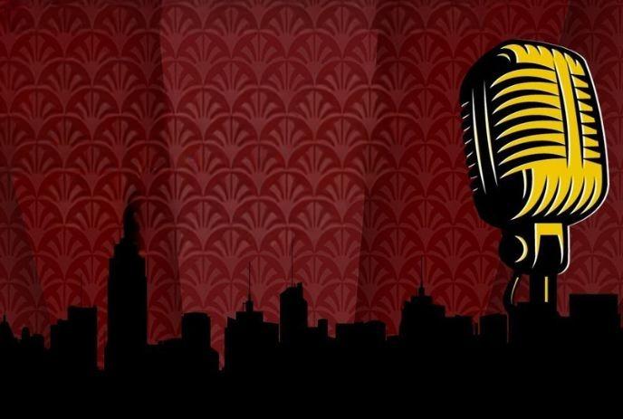Vintage mic in yellow stands beside black city skyline, set against red patterned in the background.