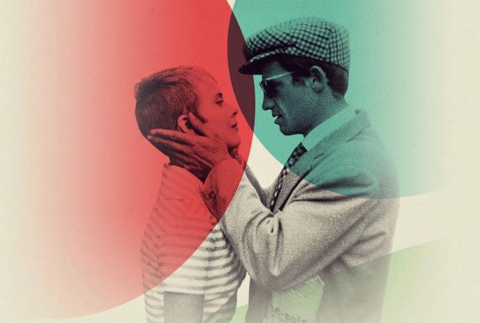 Two people in an intense embrace study each other.