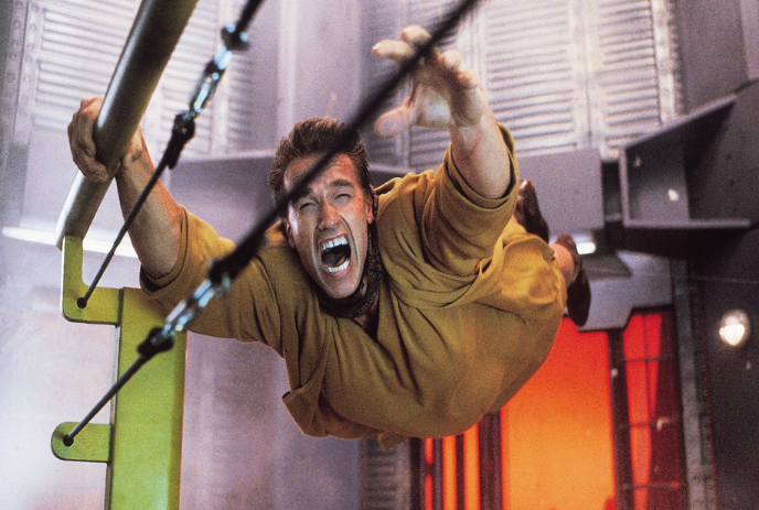 A person is holding on to some wires for dear life while screaming.
