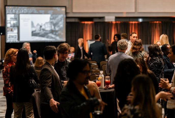 People in a conference room attending a previous Ontario Screen Creators Conference.