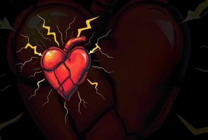 Glowing red heart with yellow lightning bolts, stylized and intense, set against a dark shadowed backdrop.