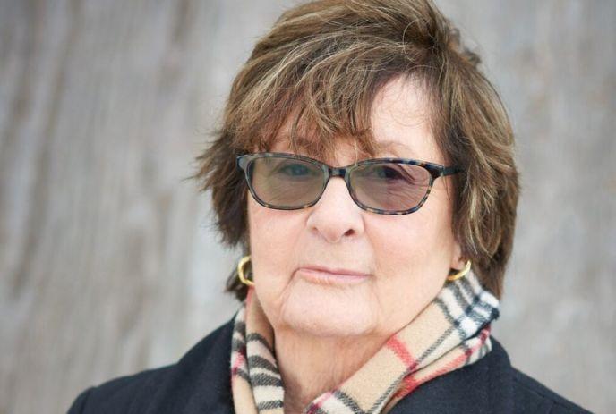 A close up head shot of Maureen Jennings.