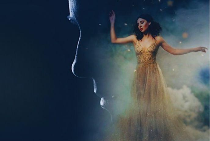 Shadowy profile of Andrew Lloyd Webber facing a woman in sparkling gold gown amid mist and stars.
