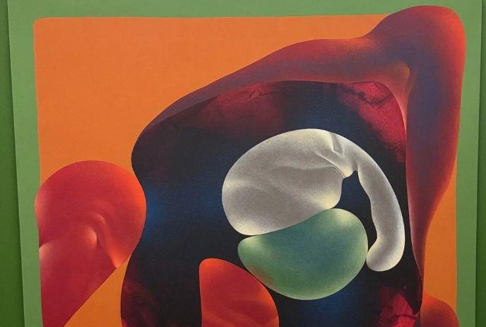 Abstract art with swirling shapes in multiple colours.