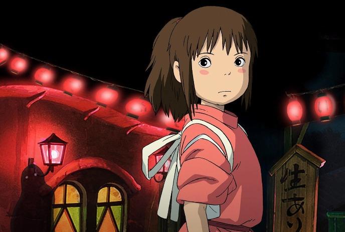 Anime girl in pink stands before glowing lantern lit building in warm night scene