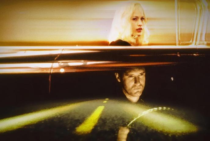 Woman and a man superimposed over top of a roadway.