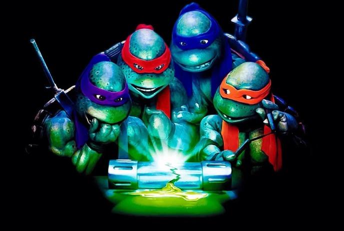 The Ninja Turtles gather around a broken glowing canister studying a spilled mysterious green substance on black background.