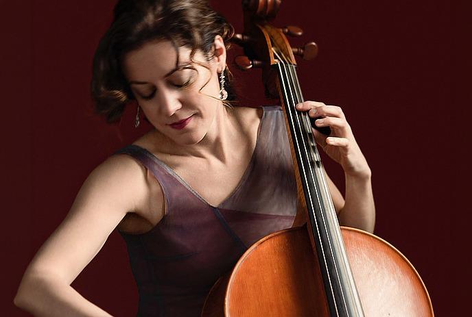 A person playing a baroque cello.