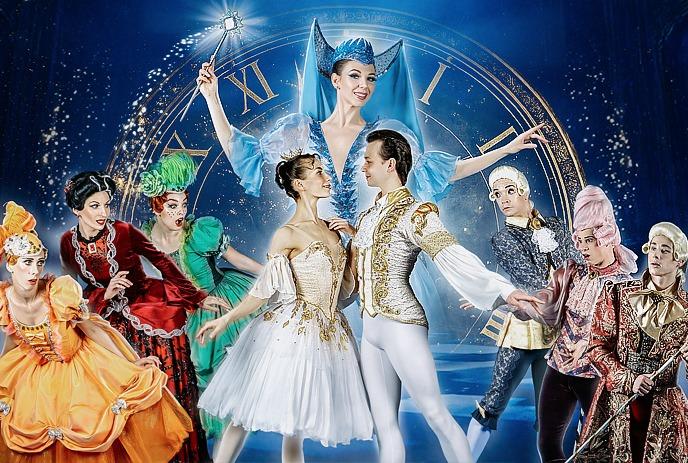 A ballet company on stage with the Fairy Godmother overlooking them