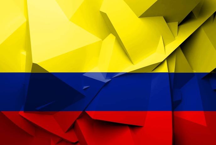 A stylized, geometric representation of the Colombian flag with yellow, blue, and red sections in a faceted, 3D design.