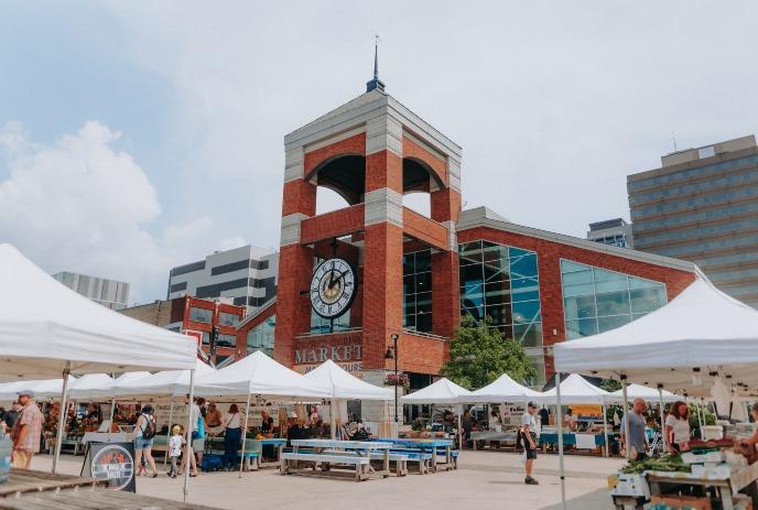 Covent Garden Market with tents set up at Rotary Square as a festival takes place.