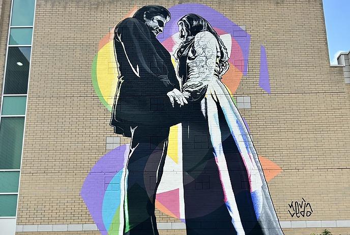 Mural at Canada Life Place of Johnny Cash proposing to June Carter.