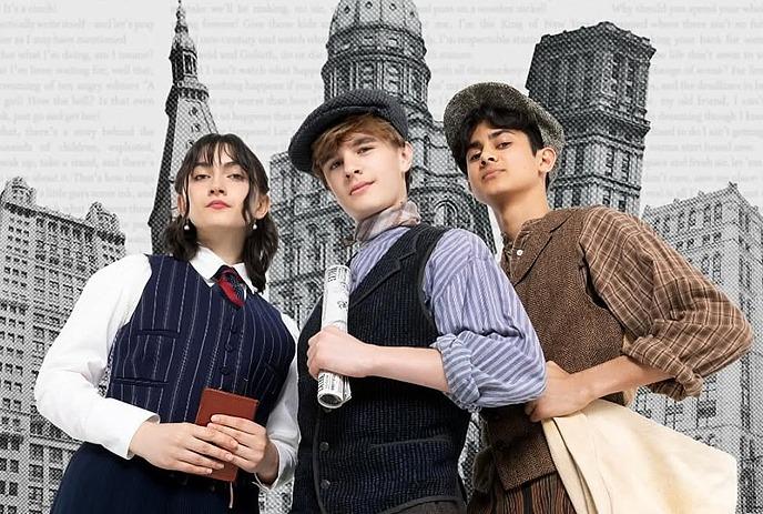 Three individuals dressed as reporters with a city backdrop behind them.