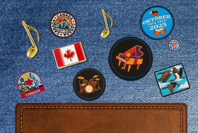 Denim with Canadian and musical patches, including a piano and Oktoberfest 2025, over leather.