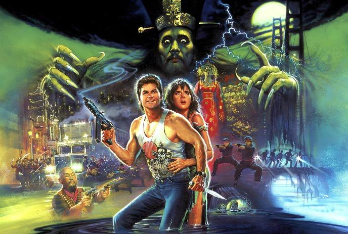 A hero stands armed beside an ally as a looming mystical figure rises behind them amid chaotic action.