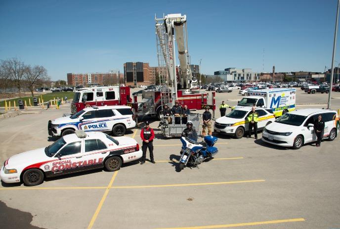 Emergency responders with their vehicles at the Emergency Preparedness Day in London, Ontario.