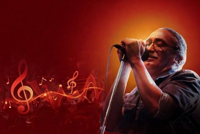 A man passionately sings into a microphone against a vibrant red background with musical notes and waveforms.